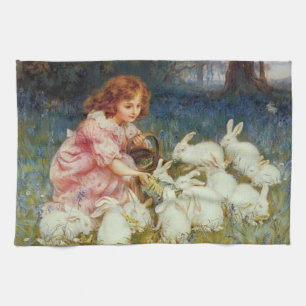 Girl feeding rabbits tea towel