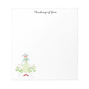 Girl in a garden of daises notepad