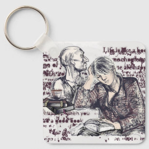 girl reading a book key ring