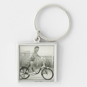 Girl Riding Bicycle Key Ring