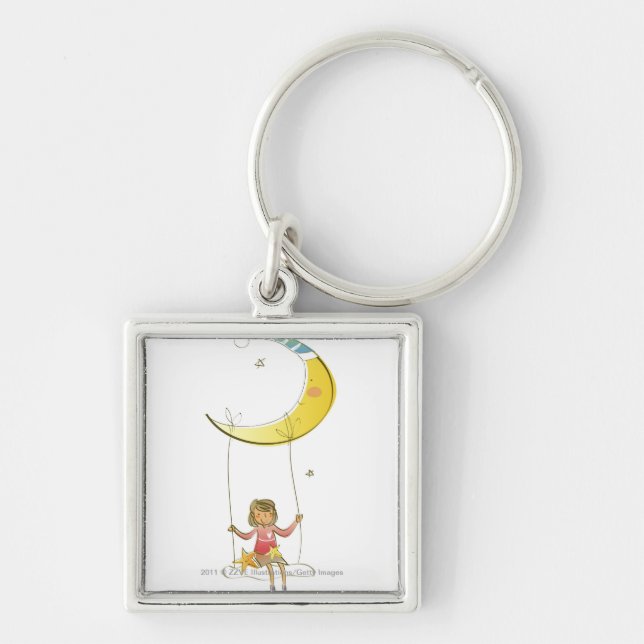 Girl swinging on a rope hanging from crescent moon key ring (Front)