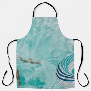 Girl wearing swimsuit and swims in swimming pool apron