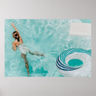 Girl wearing swimsuit and swims in swimming pool poster
