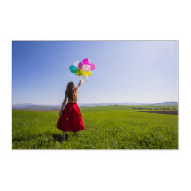 Girl with Balloons on Field