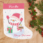Girls Cute Pink Happy Snowman Northpole Small Christmas Stocking<br><div class="desc">Personalised Pink Snowman Christmas Stocking Add a touch of holiday happiness with this charming snowman Christmas stocking! Set against a snowy winter background, this stocking features a cheerful pink snowman with gifts and a festive "Merry Christmas" greeting. Easily customise the name at the top for a one-of-a-kind holiday keepsake that...</div>