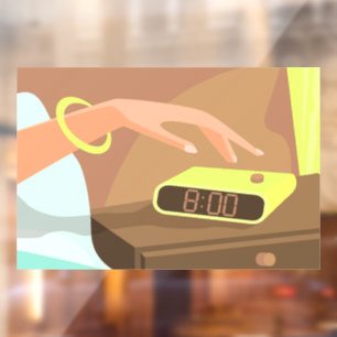 Girls hand pushing on alarm clock snooze button