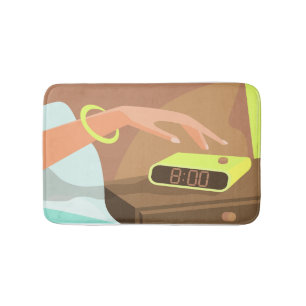 Girls hand pushing on alarm clock snooze button bath mat
