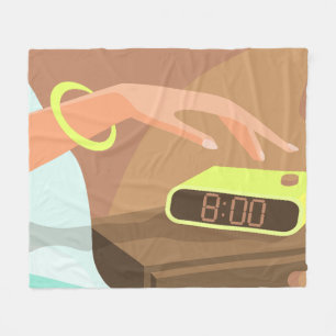 Girls hand pushing on alarm clock snooze button fleece blanket
