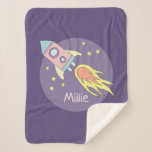 Girl's Pink Rocket Ship Space Galaxy and Name Sherpa Blanket<br><div class="desc">This gorgeous kids sherpa blanket features a beautiful and colourful hand drawn rocket ship in outer space. The design also features a place for you to add your girl's name. Perfect for any toddler or child!</div>