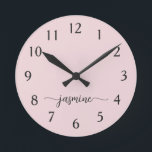 Girly Minimalist Monogram Name Signature Script Round Clock<br><div class="desc">Girly Simple Minimalist Blush Pink Monogram Name Script Custom Personalised Round Clock. These design featuring your first name in a pretty hand lettered style swash tail font signature typography on blush pink rose or dusty pastel pink. These are easy to customise it. Great stylish feminine housewarming gift, also for birthday,...</div>