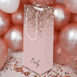 Girly Rose Gold Blush Pink Glitter Monogram Wine Gift Bag<br><div class="desc">Girly Rose Gold - Blush Pink Sparkle Glitter Script Monogram Name Gift Bag. This makes the perfect sweet 16 birthday,  wedding,  bridal shower,  anniversary,  baby shower or bachelorette party gift bag for someone that loves glam luxury and chic styles.</div>