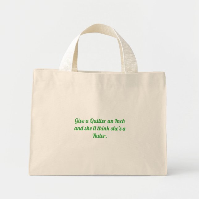 Give a Quilter an Inch Mini Tote Bag (Front)