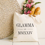 Glamma Roman Numeral Year Established Tote Bag<br><div class="desc">A modern minimalist tote bag to celebrate a chic grandma,  this clean minimal tote features "Glamma" or your choice of grandma nickname in black serif lettering. Customise with the year she became a grandmother beneath in elegant roman numerals for a chic touch.</div>
