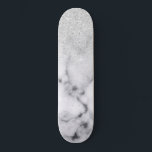 Glamourous Silver White Glitter Marble Gradient Skateboard<br><div class="desc">This elegant and girly design perfect for the trendy and stylish fashionista. It features a faux printed silver sparkly glitter ombre gradient on top of a black and white marble stone pattern background. It's glamourous, chic, luxurious, modern, and classy. ***IMPORTANT DESIGN NOTE: For any custom design request such as matching...</div>