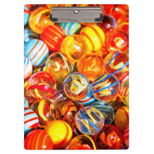 Glass marbles colourful old school red yellow blue clipboard
