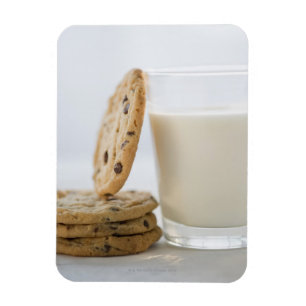 Glass of milk and cookies, close-up magnet