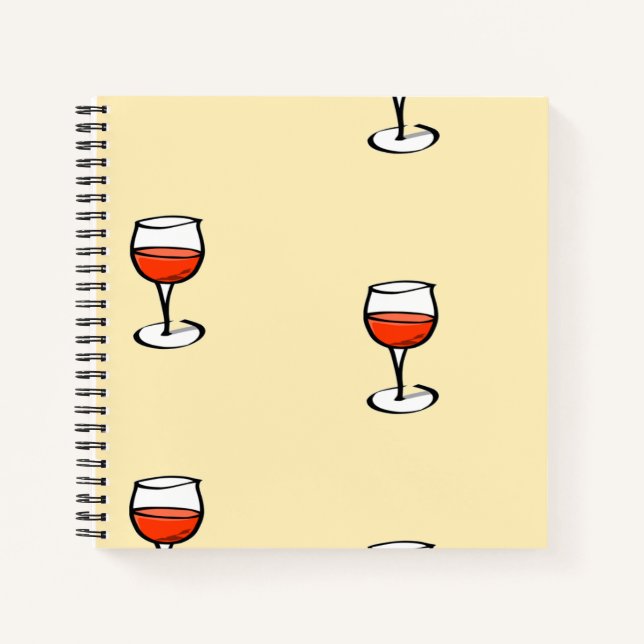 Glass of wine on orange notebook (Front)
