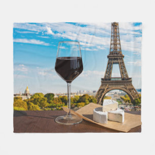 Glass of wine with brie cheese on Eiffel tower Fleece Blanket