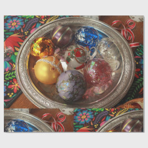 Glass ornaments in silver box with folk art wrapping paper