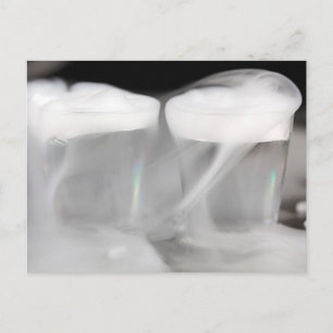 Glasses with water and dry ice postcard