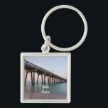Glassy Waters At Panama City Beach Square Keychain<br><div class="desc">Customizable keychain with your name featuring a tranquil morning along the Emerald Coast, with the stunning green-blue waters captured in a silky long exposure beneath the Panama City Beach Fishing Pier in Florida. Looking for more prints or products? Feel free to visit my store: http://www.zazzle.com/timelessmomentsphtgy This photo was taken by...</div>