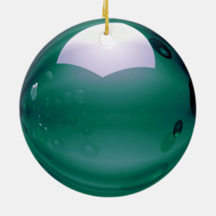 Gleaming sphere in deep green ceramic ornament