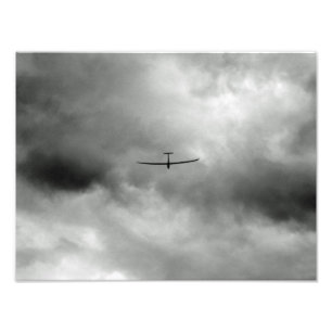 Glider flying in grey sky photo print