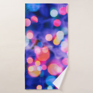 glittering shine bulbs lights background:blur of C Bath Towel