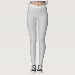 Glittering white stars on silver grey leggings