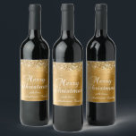 Glittery Gold Foil Merry Christmas Wine Label<br><div class="desc">Fancy calligraphy Merry Christmas wine label stickers for your special holiday gifts. Faux sparkly gold glitter on the top and bottom edge over a faux golden yellow brushed metal style ombre foil. The colour of the old-fashioned text graphic can be changed. The main colours in this girly design are gold,...</div>