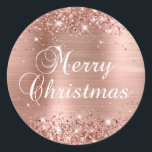 Glittery Rose Gold Foil Merry Christmas Classic Round Sticker<br><div class="desc">Fancy calligraphy Merry Christmas envelope seal stickers for your special holiday greetings or invite. Girly faux sparkly rose gold glitter on the top and bottom edge over a faux blush pink and rose gold brushed metal style ombre foil. The colour of the old-fashioned text graphic can be changed. The main...</div>