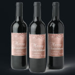 Glittery Rose Gold Foil Merry Christmas Wine Label<br><div class="desc">Fancy calligraphy Merry Christmas wine label stickers for your special holiday gifts. Faux sparkly rose gold glitter on the top and bottom edge over a faux pink blush and rose gold ombre foil. The colour of the old-fashioned text graphic can be changed. The main colours in this girly design are...</div>