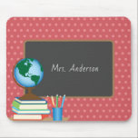 Globe Books Pencils Teacher  Mouse Pad<br><div class="desc">This teacher mouse pad features a graphic of a teacher's desk accented with a globe,  books,  apples and pencils. A chalkboard appears on a salmon and pink polka dot background and offers custom text for the teacher's name.</div>