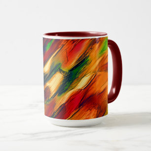 Glossy stained from red to orange, a little green mug