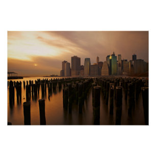 Glow of sunset during stormy skies over East Poster