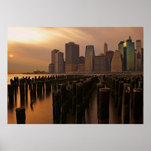 Glow of sunset during stormy skies over East Poster (Front)