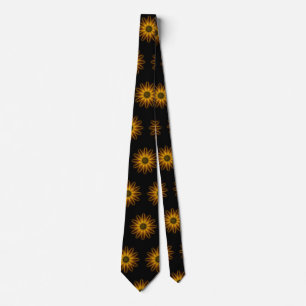 glowing gold flower on black tie