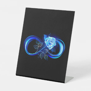 Glowing infinity with blue rose pedestal sign