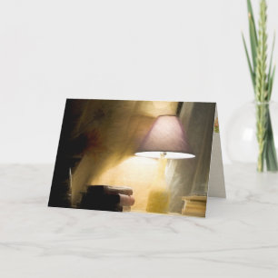 glowing lamp with old books impressionism card