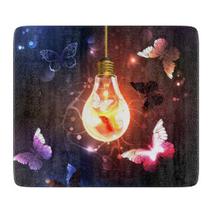 Glowing Light Bulb with Night Butterflies Cutting Board