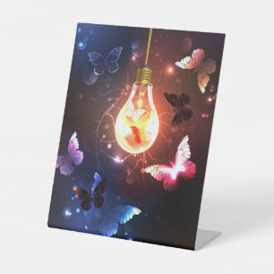 Glowing Light Bulb with Night Butterflies Pedestal Sign