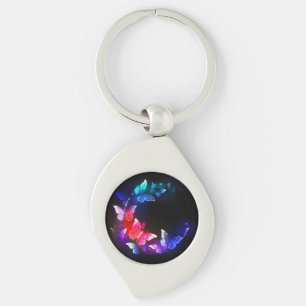 Glowing Neon Night Butterflies on Black background Key Ring