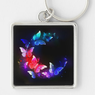 Glowing Neon Night Butterflies on Black background Key Ring