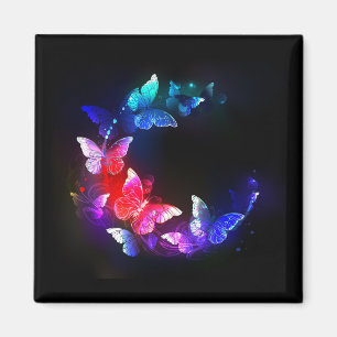 Glowing Neon Night Butterflies on Black background Magnet