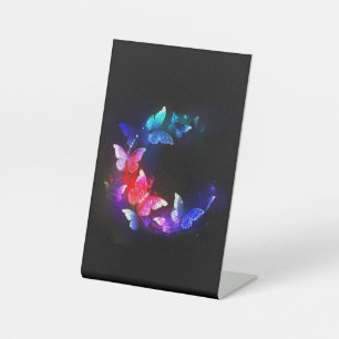 Glowing Neon Night Butterflies on Black background Pedestal Sign