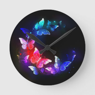 Glowing Neon Night Butterflies on Black background Round Clock