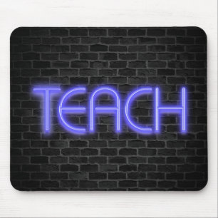 glowing neon TEACH sign on brick Mouse Pad