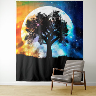 Glowing planet over starry sky and big tree tapestry