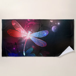 Glowing red dragonfly beach towel