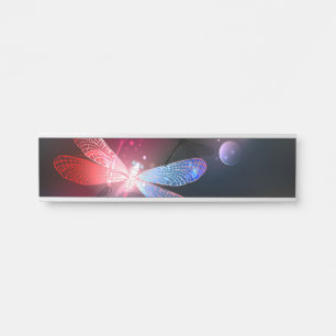 Glowing red dragonfly door sign
